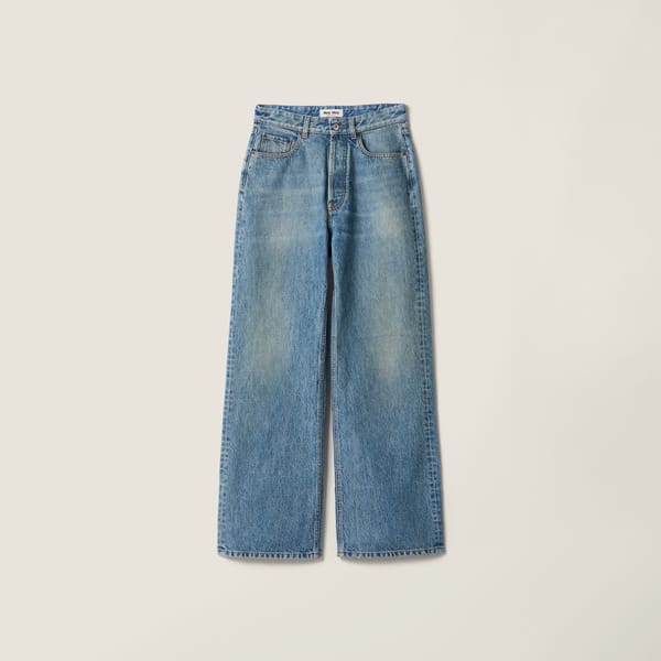 Five-pocket washed denim jeans